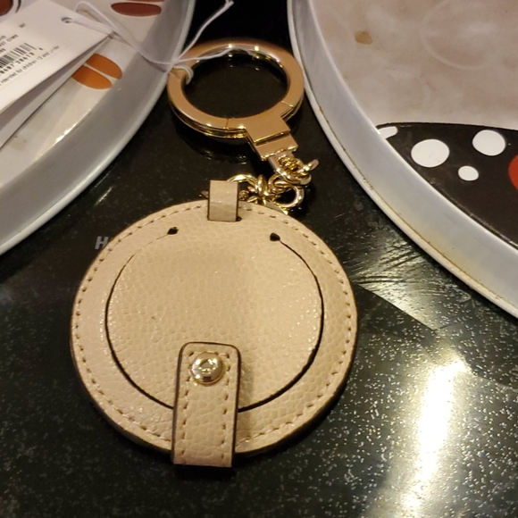 kate spade Accessories - Kate spade mirror keychain my fave leather on my bag 🎒